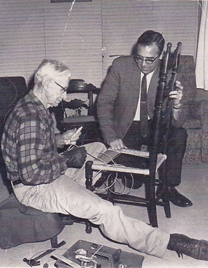 My grandfather Hobert Clements demonstrating rush weaving.